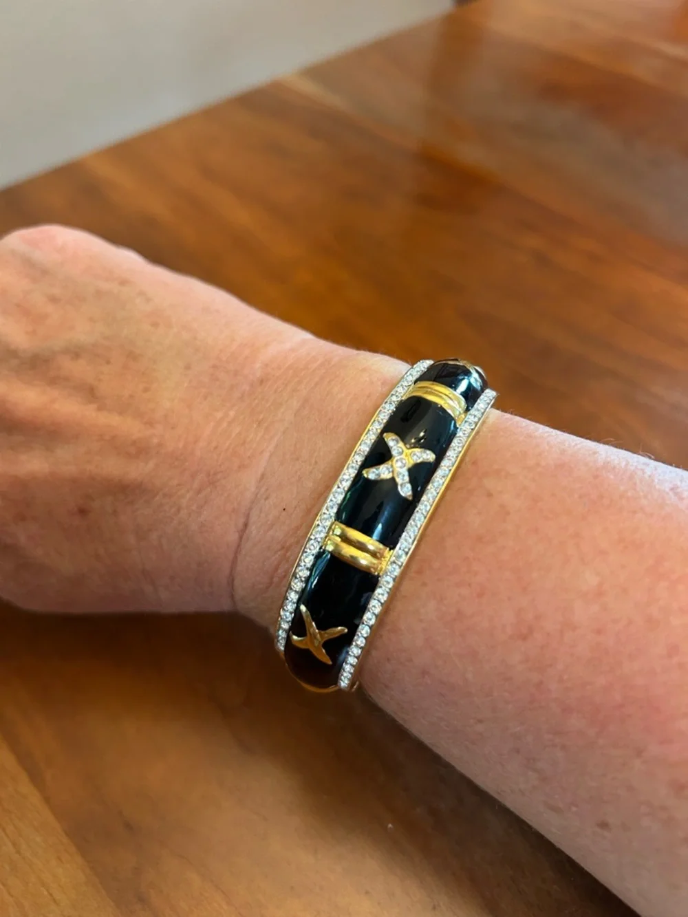 Gold-Tone Black Enamel X Accent Bangle Bracelet